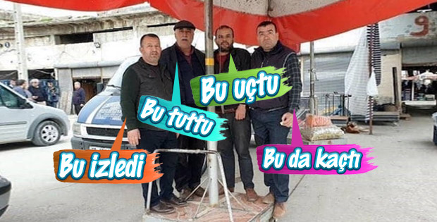 Şemsiyeyle uçan adamlar poz verdi